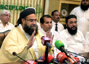 Hafiz Muhammad Tahir Mehmood Ashrafi Chairman Pakistan Ulema Council addressing a press conference at DC office.
