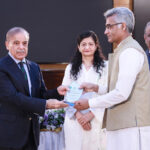 Prime Minister Muhammad Shehbaz Sharif distributing Awards among the high performing officers of the Federal Board of Revenue