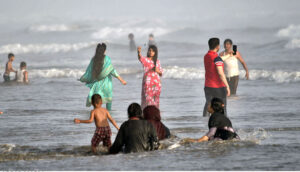 youngster enjoying horse ride as a large number of people arrives at Seaview to get some relief from hot weather in Provincial Capital.