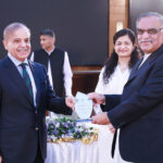 Prime Minister Muhammad Shehbaz Sharif distributing Awards among the high performing officers of the Federal Board of Revenue