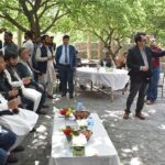 Federal Minister for Kashmir Affiars and Gilgit-Baltistan Engineer Amir Muqam being berifed by Project Director about the 54 Maga Wat hydro power project at Attaabad Lake Hunza