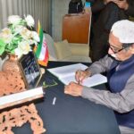 Former Speaker Balochistan Assembly Jan Muhammad Jamali pen message in a condolence book placed at Consulate General of the Islamic Republic Iran following the death of Iranian President Ebrahim Raisi.