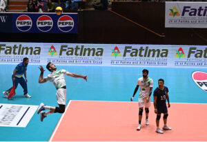 Australian and Pakistani volleyball players compete during a volleyball match at Sarfraz Volleyball Series at sports complex