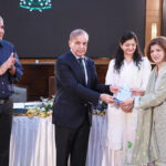 Prime Minister Muhammad Shehbaz Sharif distributing Awards among the high performing officers of the Federal Board of Revenue