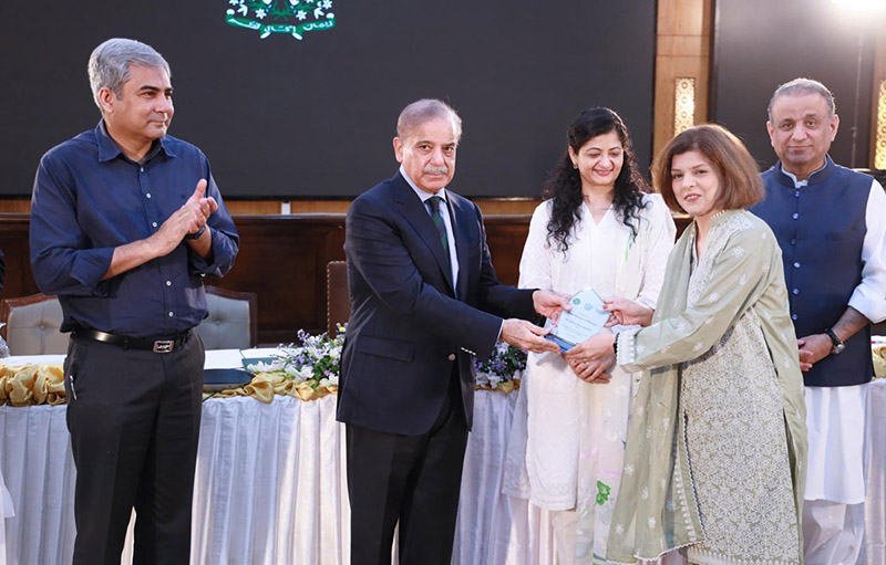 Prime Minister Muhammad Shehbaz Sharif distributing Awards among the high performing officers of the Federal Board of Revenue