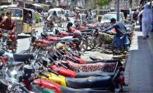 Illegal Motorcycle parking at Kandhari Bazar causing traffic jam during the school and office hours.