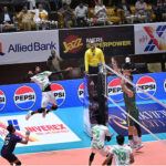 Australian and Pakistani volleyball players compete during a volleyball match at Sarfraz Volleyball Series at sports complex