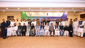 Additional Secretary Social Welfare Muhammad Farooq and Program Manager UNICEF Dr. Hassam in a group photo along with other officials and participants during the closing ceremony of Child Protection Case Management Training.