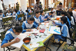 The schoolgirls being taught making of sculpture at SBP Museum on the occasion International Museum Day.