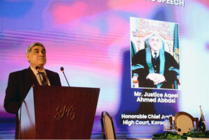 Chief Justice of Sindh Justice Aqeel Ahmed Abbasi giving souvenir to the participants during Pakistan International Disputes Weekend' conference organized by Sindh High Court and Chartered Institute of Arbitrators