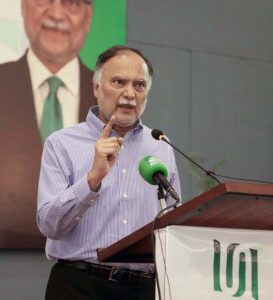 Federal Minister for Planning, Development and Special Initiatives Ahsan Iqbal is addressing to the participants of Peace, Education and Development Conference under the auspices of the University of Narowal at Narowal Sports Gymnasium.