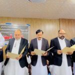Federal Minister Engineer Amir Muqam taking oath from newly elected cabinet of the District Bar Association