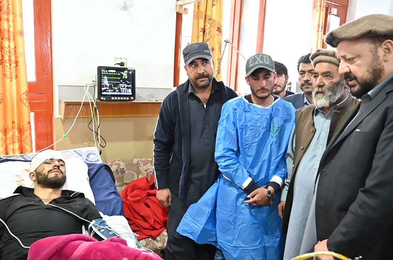 Chief Minister Gilgit-Baltistan Haji Gulbar Khan inquiring about the health of injured persons at PHQ as a passenger bus faced an accident near Chilas in a result 22 died and other injured.