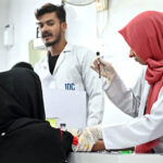 Staff taking blood sample for test at JDC Foundation Pakistan’s Free Diagnostic Lab at M.A. Jinnah Road.
