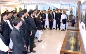A group photograph of students and faculty members of Shariah & Law Department Of Islamia College Peshawar in the senate hall at Parliament House