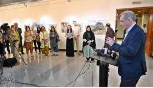 Visitors viewing paintings during exhibition "Impression of Pakistan" by Gonzelo Ruiz Navarro organized by Pakistan National Council of the Arts and the Embassy of Spain at PNCA.