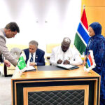Deputy Prime Minister and Foreign Minister Senator Mohammad Ishaq Dar and Gambian Minister of Foreign Affairs, International Cooperation and Gambians Abroad, Dr. Mamadou Tangara signing MoU on Bilateral Political Consultations on the sidelines of the 15th Islamic Summit, in Banjul