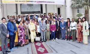 Chamber of Commerce President, Abdul Ghafoor Malik presenting a shield to Additional Secretary Ministry of Foreign Affairs Muhammad Salim Bhatti during foreign diplomats delegation visit SCCI.