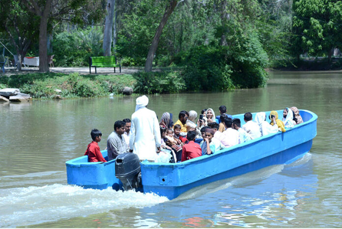 Visitors enjoy boat ride at Gutwala Park on the 3rd day of Eid-ul-Adha holidays