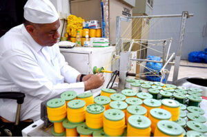 MAKKAH AL-MUKARRAMAH: June 14 – Artisans decorate Kiswah, the covering of the Holy Kaaba, with verses from the Holy Quran embroidered onto the it, at a Kiswah manufacturing factory.