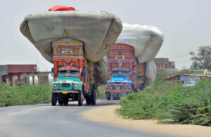 A view of a fully loaded trucks with dry fodder may cause any mishap and need the attention of concerned authorities Thatta road.