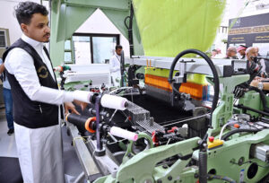 MAKKAH AL-MUKARRAMAH: June 14 – Artisans decorate Kiswah, the covering of the Holy Kaaba, with verses from the Holy Quran embroidered onto the it, at a Kiswah manufacturing factory.