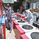 Workers are making room coolers at his Work Place as per increasing demand in summer season