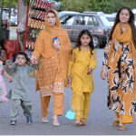 A family members visiting Lake View Park on the second day of Eid ul Azha celebrations in the federal capital. The park is restricted just for families during Eid holidays