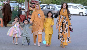 A family members visiting Lake View Park on the second day of Eid ul Azha celebrations in the federal capital. The park is restricted just for families during Eid holidays