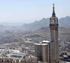 An aerial view of the Holy Kaaba and the Clock Tower in its premises, captured through a helicopter flight