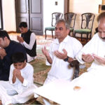 Federal Minister for Interior Mohsin Naqvi offering Dua after Eid prayer