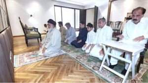 Federal Minister for Interior Mohsin Naqvi offering Dua after Eid prayer