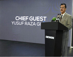 Chairman Senate Syed Yosuf Raza Gillani addressing during rollout ceremon of KIA Shehzore truck at Deewan Farroque Motors, Auto assembly plant at Sujawal, District of Sindh.