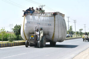 A view of an overloaded tractor trolley with chaff (wheat husk) at Nag Shah road may cause any mishap that needs the attention of the concerned authority.