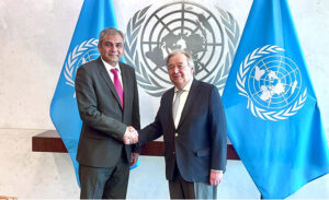 Federal Minister for Interior Mohsin Naqvi shaking hands with UN Secretary General Antonio Guterres.