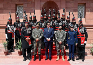 Governor KPK Faisal Karim Kundi in a group photograph with Rangers guards and other officials at Mazar-e-Iqbal