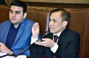 H.E. MR. Rahmat Hindiarta Kusuma Charge'D Affaires, Embassy of the Republic of Indonesia addressing to Business Community at Chamber of Commerce.