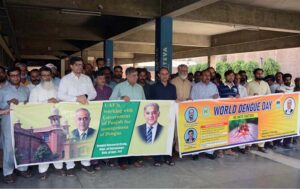 People from different walks of life participating in an awareness walk in connection with World Anti Dengue Day organized by Department of Entomology, Faculty of Agriculture at University of Agriculture Faisalabad (UAF).