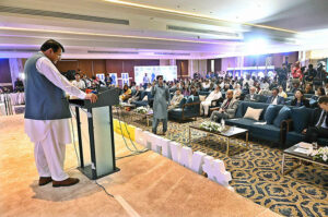 Federal Minister for States & Frontier Regions (SAFRON), Kashmir Affairs and Gilgit-Baltistan Engineer Amir Muqam addressing a seminar on "World Refugee Day-2024" organized by UNHCR.