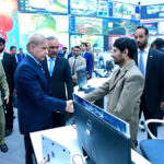 Prime Minister Muhammad Shehbaz Sharif meets the staff of the National Emergencies Operation Centre