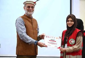 Head of Department International Federation of Red Cross and Red Crescent (IFRC) Peter Ophoff giving away certificate to the participant during the seminar on Road Safety 2024 organized by Pakistan Red Crescent Gilgit-Baltistan