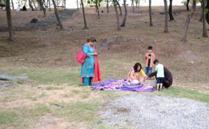 A family enjoying barbeque during their visit to Kanwal Lake on the 3rd day of Eidul Azha holiday in the city