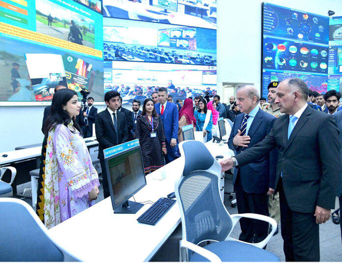 Prime Minister Muhammad Shehbaz Sharif meets the staff of the National Emergencies Operation Centre