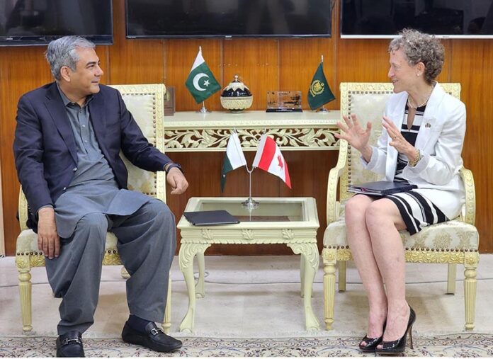 Federal Minister for Interior Mohsin Naqvi in a meeting with Canadian High Commissioner Leslie Scanlon