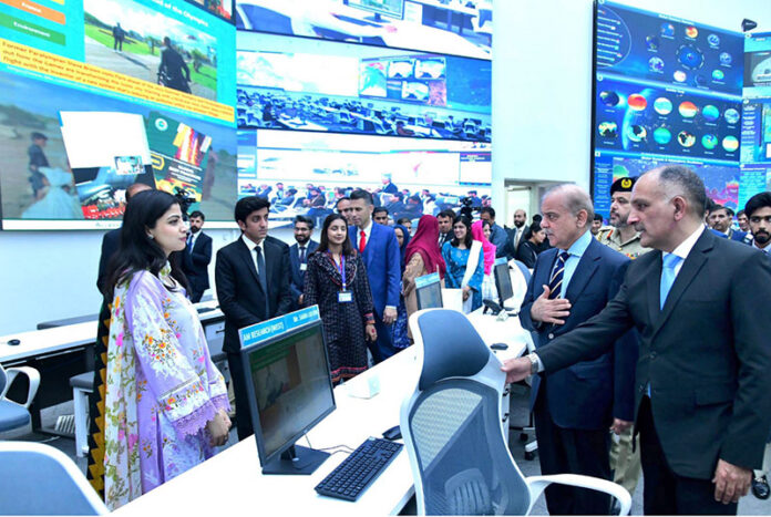 Prime Minister Muhammad Shehbaz Sharif meets the staff of the National Emergencies Operation Centre