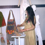 Visitors viewing the displayed items during the Art and Design exhibition (Degree Show 2024) at Johar Town