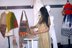 Visitors viewing the displayed items during the Art and Design exhibition (Degree Show 2024) at Johar Town