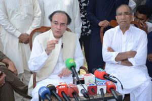 Federal Minister for Finance & Revenue Senator Muhammad Aurangzeb addresses a press conference in Kamalia