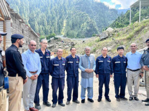 Group photo of Deputy Prime Minister and Foreign Minister Senator Mohammad Ishaq Dar with Chinese engineers and Pakistani team during his visit to Jagran-2 Hydropower Plant under construction in Neelum District, Azad Jammu and Kashmir