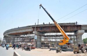 A view of construction work of flyover underway at Industrial State during development work in the city.